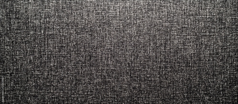 Textured dark gray fabric background with subtle patterns, evenly spread throughout the image creating a modern minimalist aesthetic. Textured dark gray fabric background with subtle patterns, evenly spread throughout the image creating a modern minimalist aesthetic.