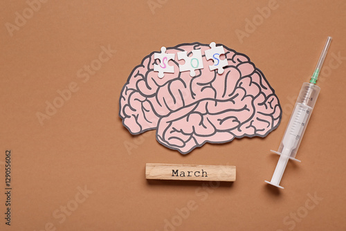 Paper brain with puzzle pie...