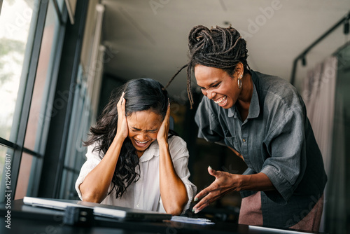 Workplace aggression, stressful work environment. Angry boss shouting at the worker in the office