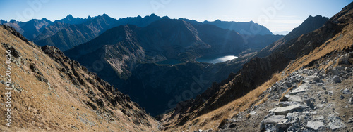 Obraz na płótnie Travel along a marked mountain trail in the High Tatras. Landscape of high mountains.
w salonie
