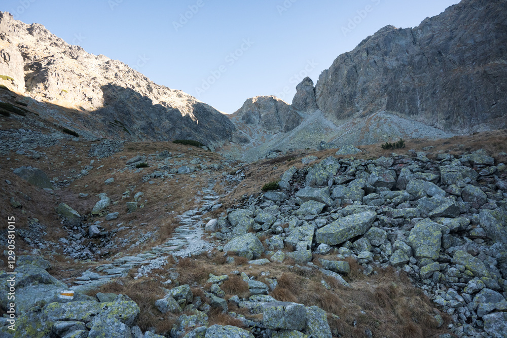 Travel along a marked mountain trail in the High Tatras. Landscape of high mountains.