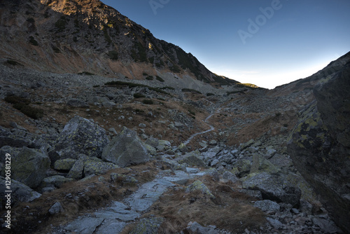 Obraz na płótnie Travel along a marked mountain trail in the High Tatras. Landscape of high mountains.
w salonie