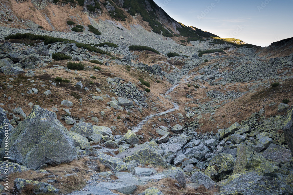 Travel along a marked mountain trail in the High Tatras. Landscape of high mountains.