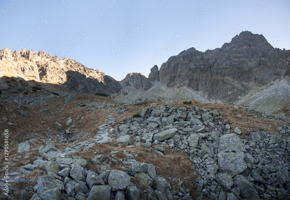 Travel along a marked mountain trail in the High Tatras. Landscape of high mountains.
