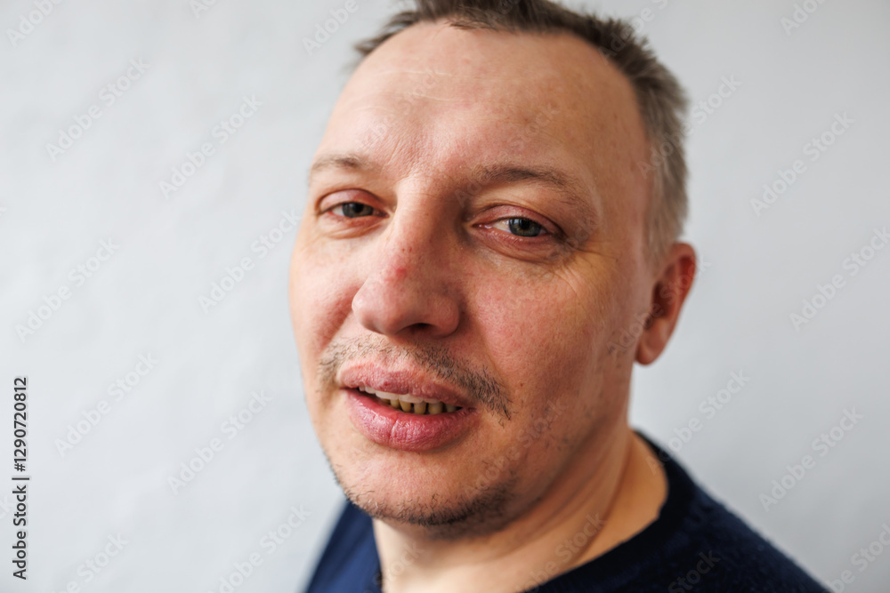 Fototapeta premium face of angry person dissatisfied with life and everything that happens. man is grimacing