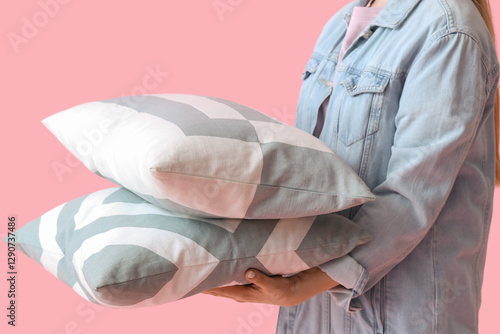 Woman carrying two decorati...