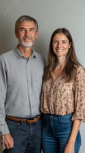 Smiling Couple Poses for a Casual Photo in a Cozy Indoor Setting