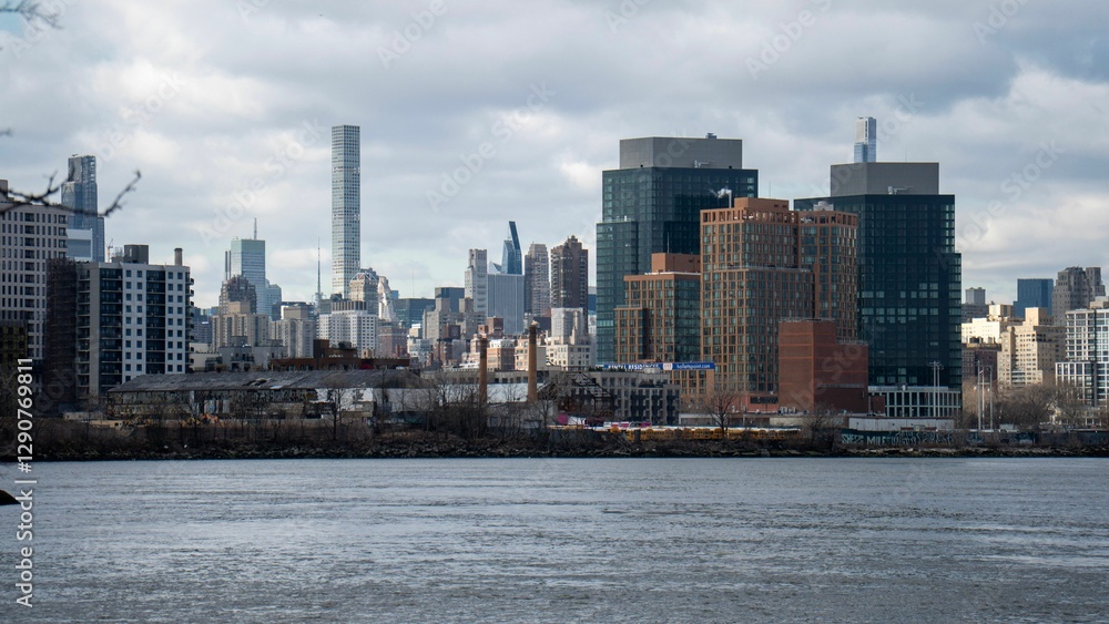 New York City skyline with skyscrapers and river. New York City skyline with skyscrapers and river.