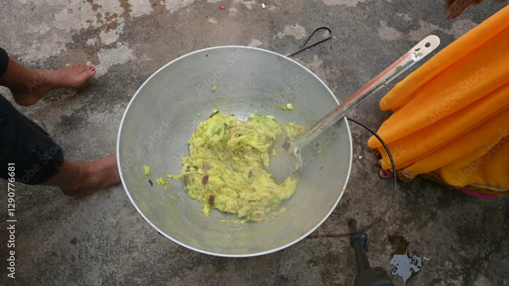 Mashed roasted eggplant or Brinjal. Its called in India Baigan ka bharta. It roasted on fire and its burnt skin is removed and mashed, then it is eaten after adding onion, garlic, chilli, salt and oil