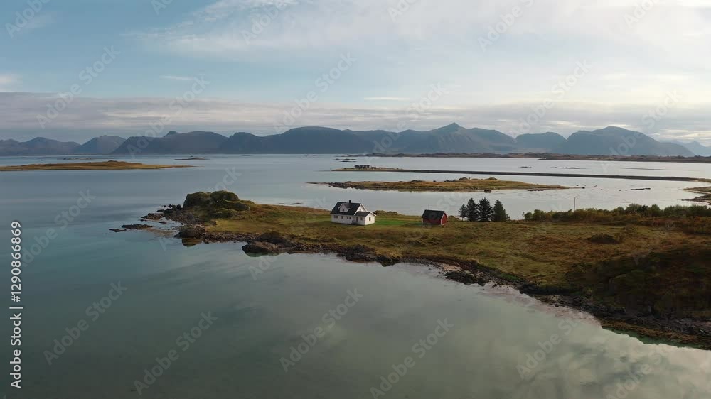 Remote scenic location in Vestarelen with calm waters, islands, and mountains Remote scenic location in Vestarelen with calm waters, islands, and mountains