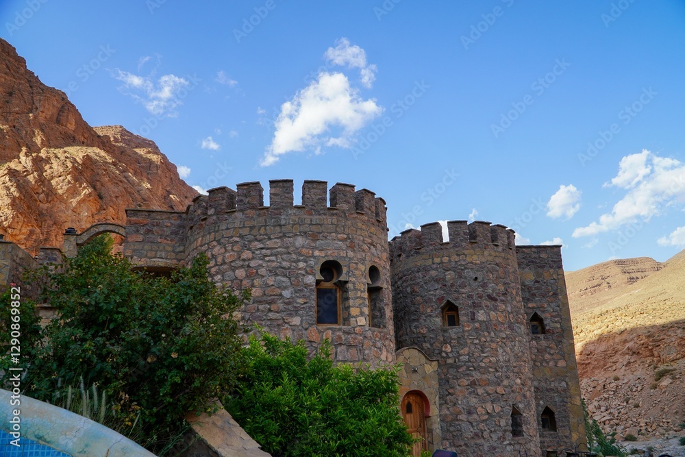 Fototapeta premium Historic stone castle with round towers.