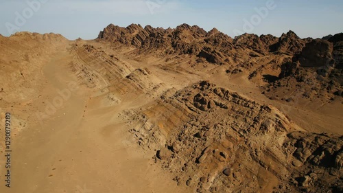 Stunning Martian-like rock formations in Mongolia, showcasing surreal and otherworldly landscapes captured in aerial drone footage.