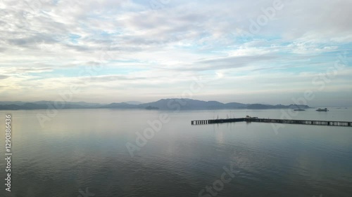 Wallpaper Mural Stunning aerial overview of reflecting water below piers with distant mountains, Point Molate Beach Richmond California USA Torontodigital.ca