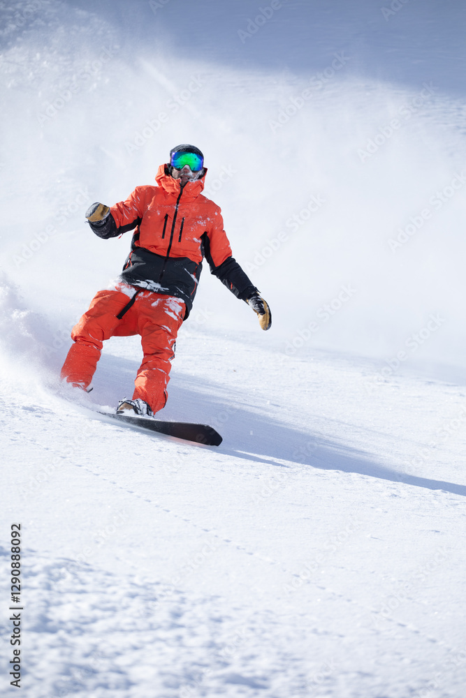 Snowboarder Gliding Down Snowy Slope in Bright Gear Snowboarder Gliding Down Snowy Slope in Bright Gear