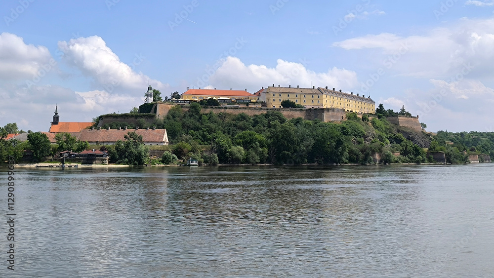 Fototapeta premium Petrovaradin fortress by the Danube ru=iver in bright spring day