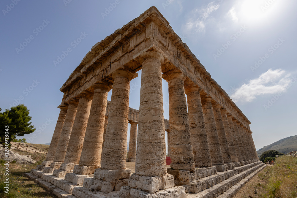 Naklejka premium SEGESTA, ITALY, JULY 1, 2023 - The Temple or Great Temple of Segesta, in the municipal territory of Calatafimi Segesta, province of Trapani, Sicily, Italy