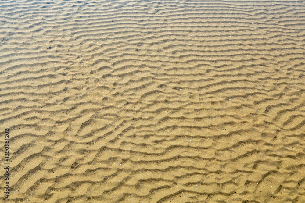 Wavy sand in shallow water of Mediterranean on sunny day. Antalya province, Turkey Wavy sand in shallow water of Mediterranean on sunny day. Antalya province, Turkey