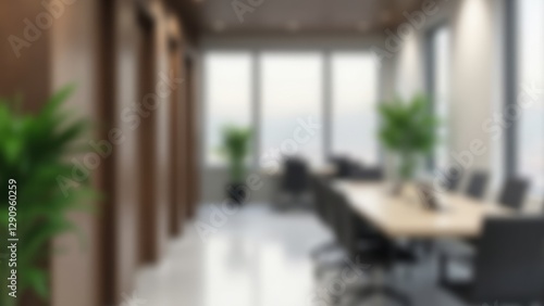 Blurry image of a conference room with a long table and chairs