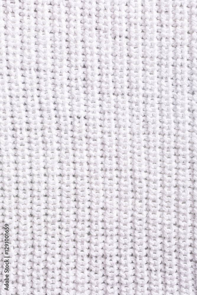 Patent brioche stitch white knitted pattern background texture. Top view of knitting clothes Patent brioche stitch white knitted pattern background texture. Top view of knitting clothes