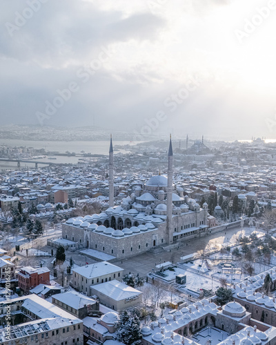 Photography fatih mosque under the snow istanbul