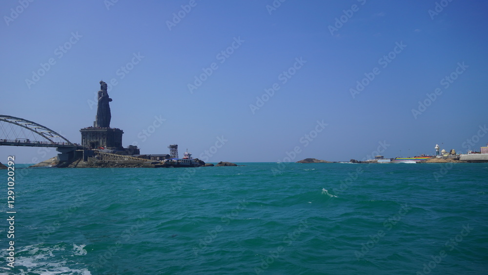 statue of Thiruvalluvar with a blue clean ocean statue of Thiruvalluvar with a blue clean ocean