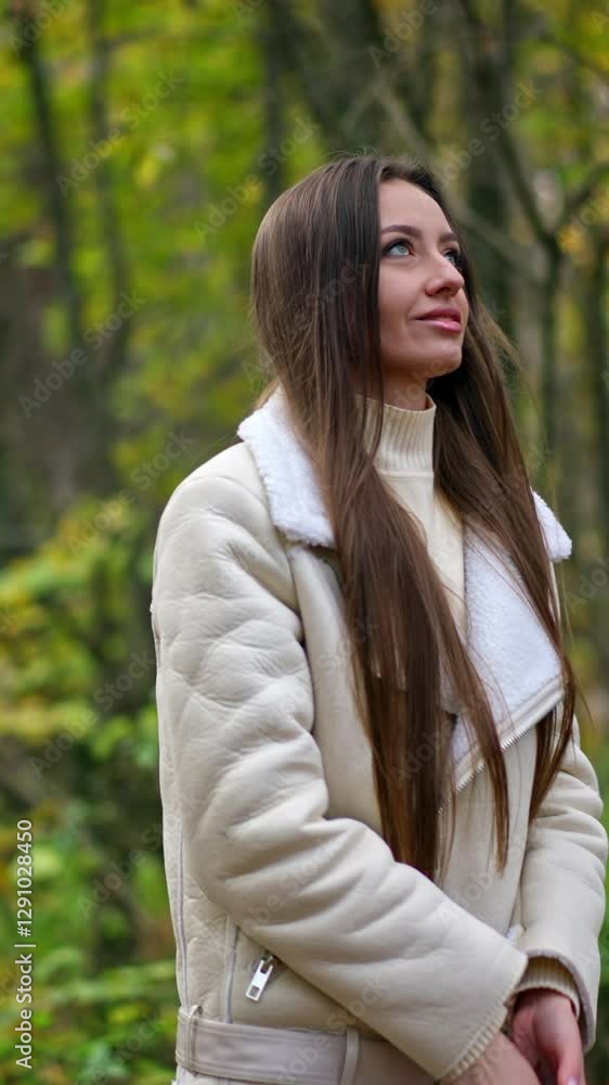Pretty young woman in the park. Beautiful lifestyle portrait lady. Vertical video Pretty young woman in the park. Beautiful lifestyle portrait lady. Vertical video