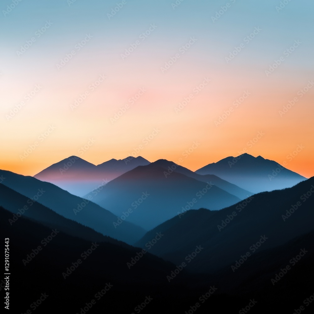 Naklejka premium Mountain range at sunset with clear sky