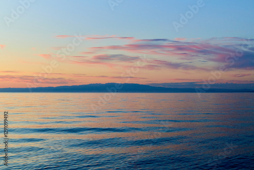 Dawn on Lake Alakol. Lake Alakol is a salt lake located in the Zhetysu and Abay regions of the Republic of Kazakhstan. Blur effect.