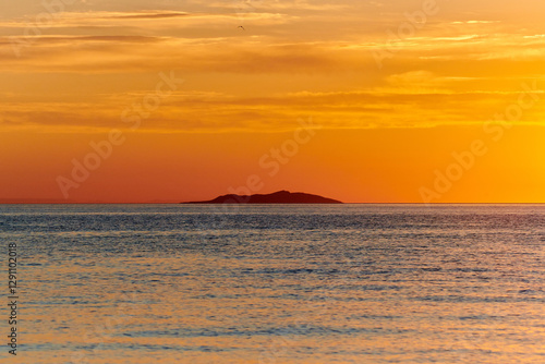 Dawn on Lake Alakol. Lake Alakol is a salt lake located in the Zhetysu and Abay regions of the Republic of Kazakhstan. Blur effect.