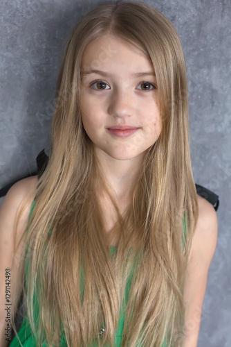 portrait of a beautiful blonde girl with big brown eyes