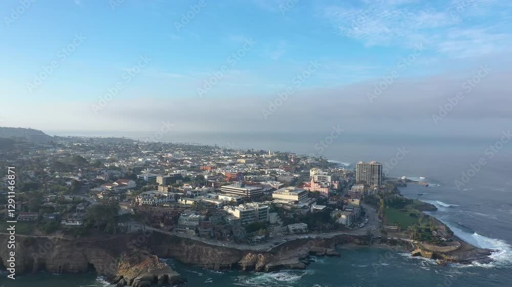 La Jolla California, aerial drone forward shot during hazy morning. La Jolla California, aerial drone forward shot during hazy morning.