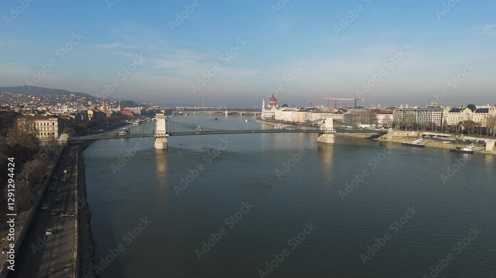 Drone overview of Budapest Chain Bridge with city buildings and the Danube River Drone overview of Budapest Chain Bridge with city buildings and the Danube River