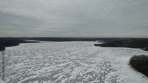 winter landscape with snow and frozen river
