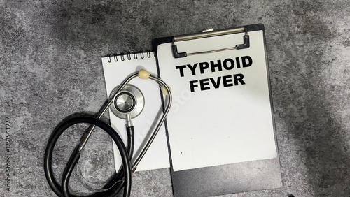 Tableau sur toile Concept of Typhoid Fever write on paperwork isolated on Wooden Table