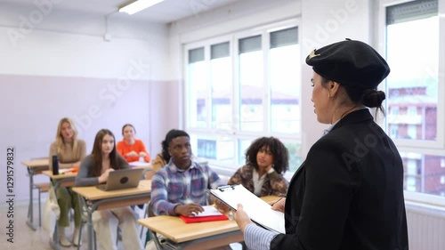 Wallpaper Mural Elegant flight attendant teaching future cabin crew members Torontodigital.ca