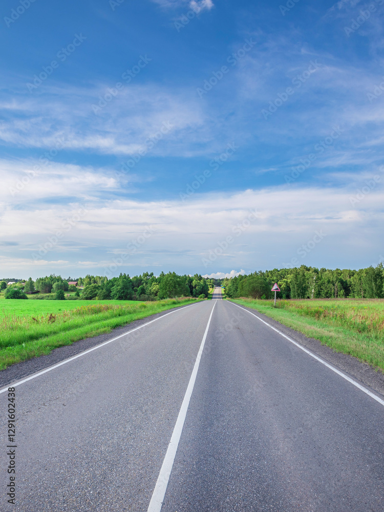 Long road with a clear blue sky above it Long road with a clear blue sky above it