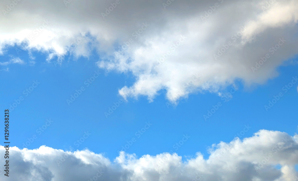 Obraz premium Large White Clouds in a Calm Blus Sky