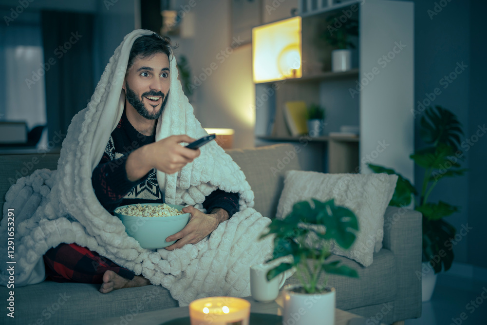 Cozy movie night with popcorn in a well-lit living room during the evening Cozy movie night with popcorn in a well-lit living room during the evening