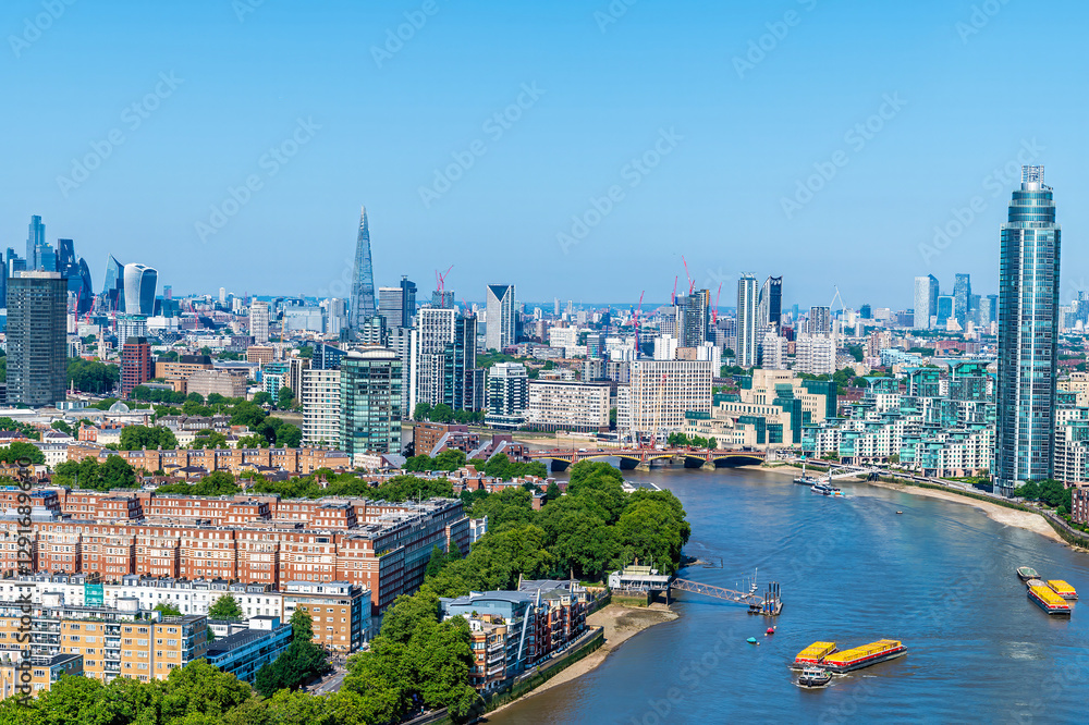 Naklejka premium An aerial view east from Battersea power station roof down the river Thames, London, UK in summertime