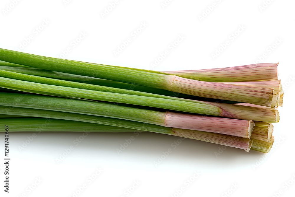 Fresh lemongrass stalks with pink bases and green stems isolated on white background, aromatic Asian herb used in cooking and natural medicine. Fresh lemongrass stalks with pink bases and green stems isolated on white background, aromatic Asian herb used in cooking and natural medicine.