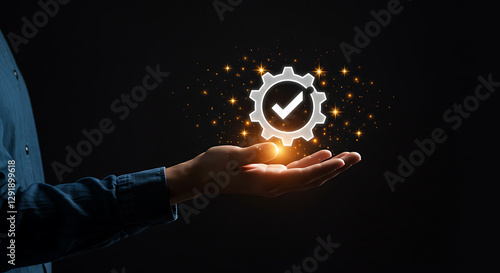 Person Displaying Glowing Gear Symbol photo