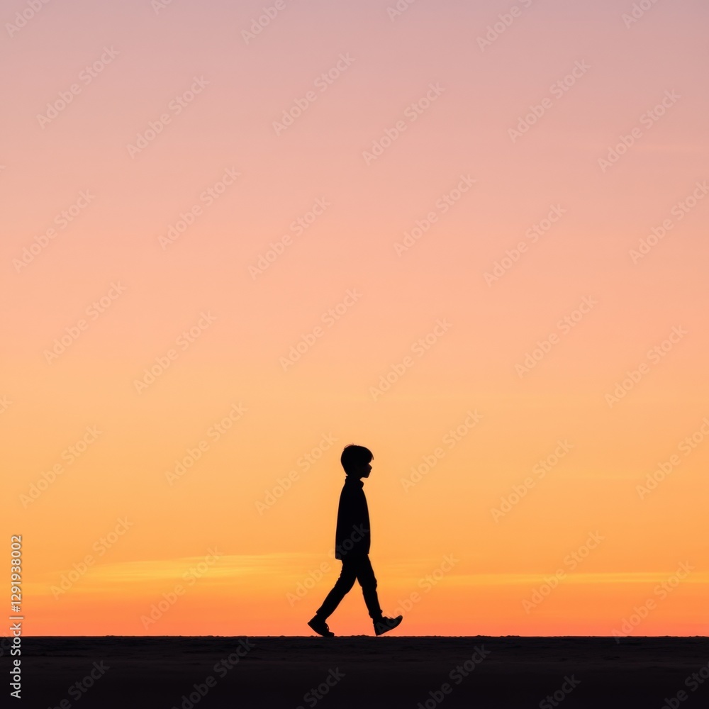 Silhouette of a child walking at sunset Silhouette of a child walking at sunset