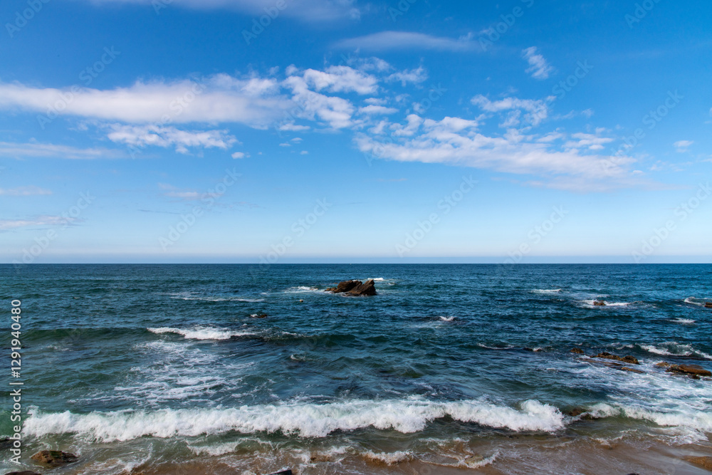 View of the rocks and surf on the sea View of the rocks and surf on the sea