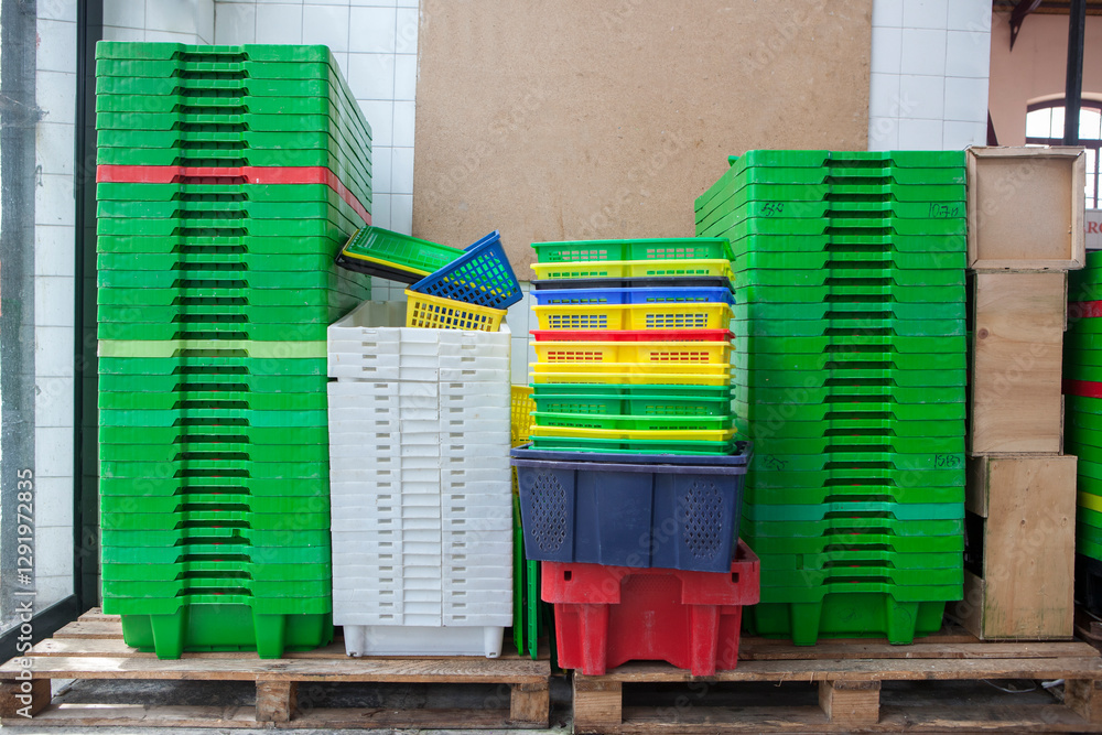 Fish containers compactly stacked together at wholesale market