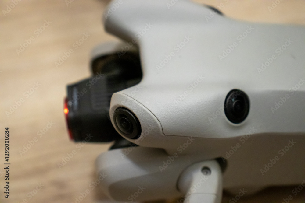 Close-up of a drone camera showcasing its intricate design and advanced technology. Perfect for tech enthusiasts and photographers. Close-up of a drone camera showcasing its intricate design and advanced technology. Perfect for tech enthusiasts and photographers.
