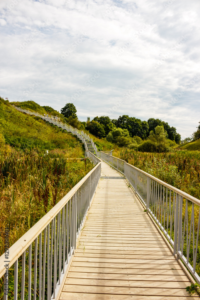Stairs going up the slope in the territory of the landscape park. Borovsk, Russia Stairs going up the slope in the territory of the landscape park. Borovsk, Russia