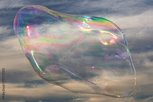 Colorful soap bubble against the sky for background