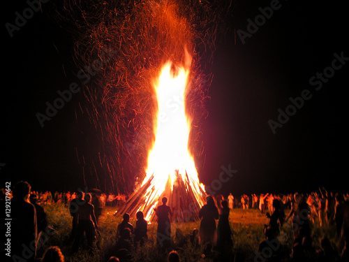 Huge festive bonfire at Slavic pagan celebration of Kupala, Russia. June 2013