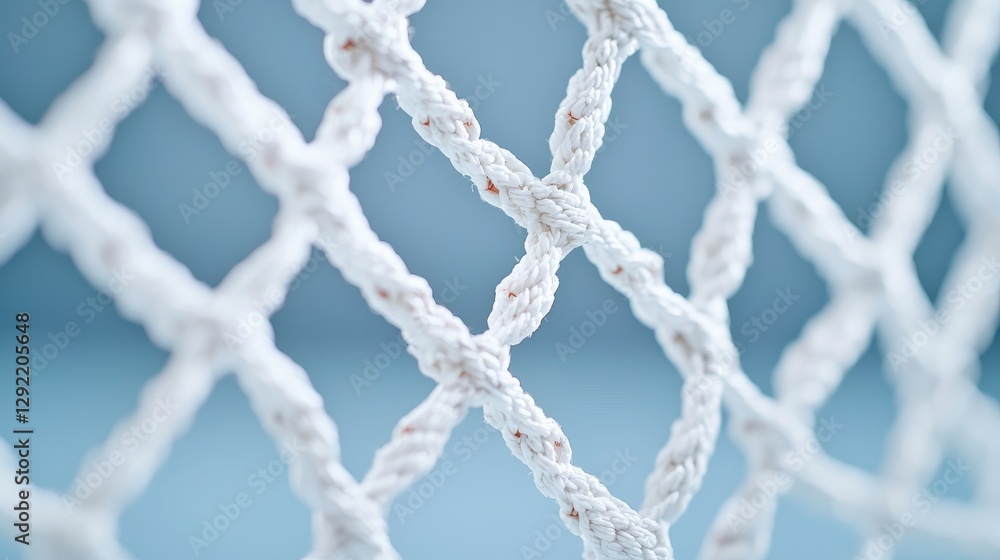 Close-up hockey net, intricate weave, light blue background Close-up hockey net, intricate weave, light blue background