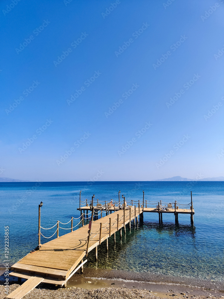 a beautiful large pier on the seashore a beautiful large pier on the seashore